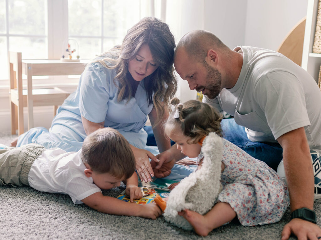 family playing on the floor